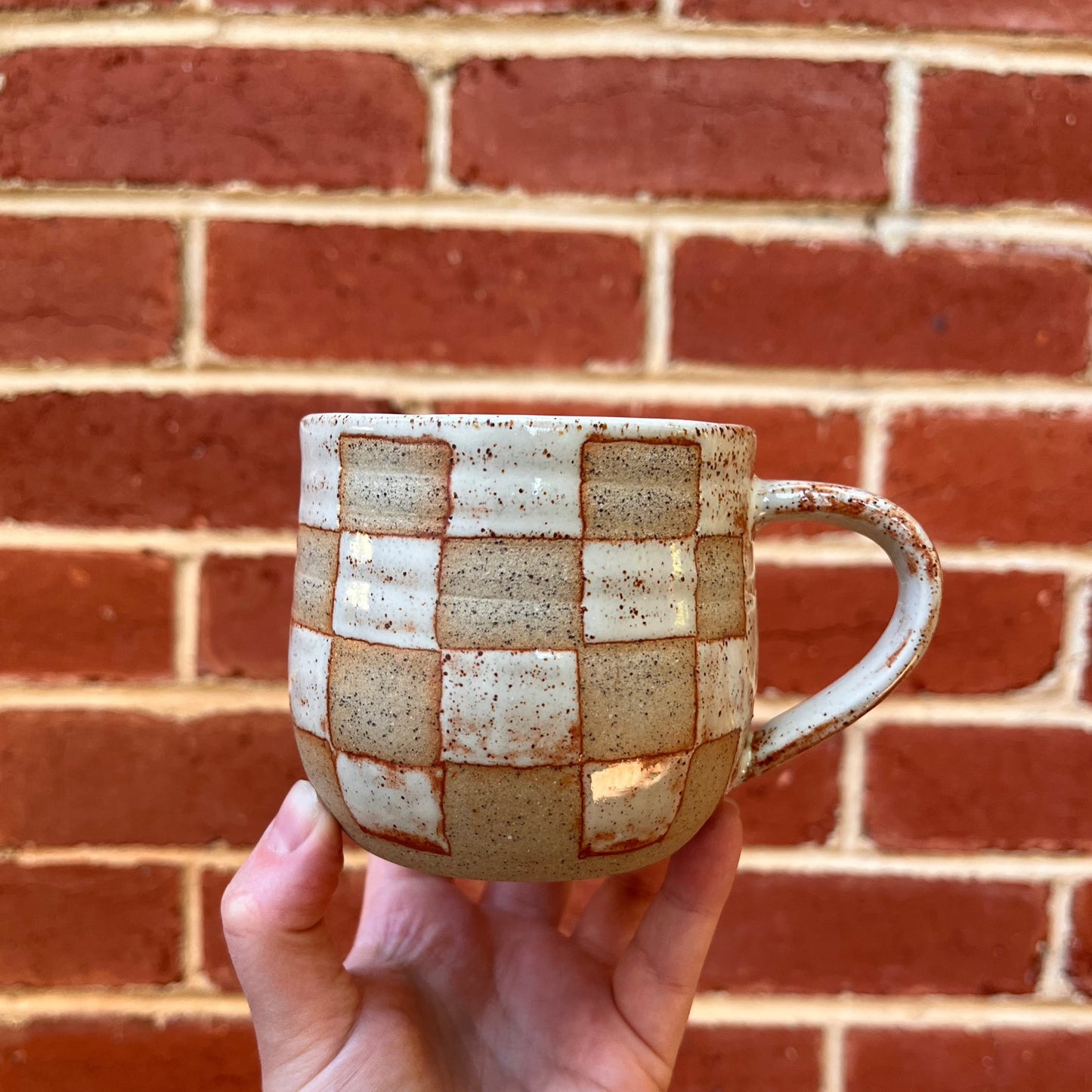 checkers mug | sand